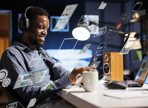 Business person using laptop multitasking to finish daily startup tasks, internet of things concept. Uses artificial intelligence optimization system for productivity, access pc smart things menu.